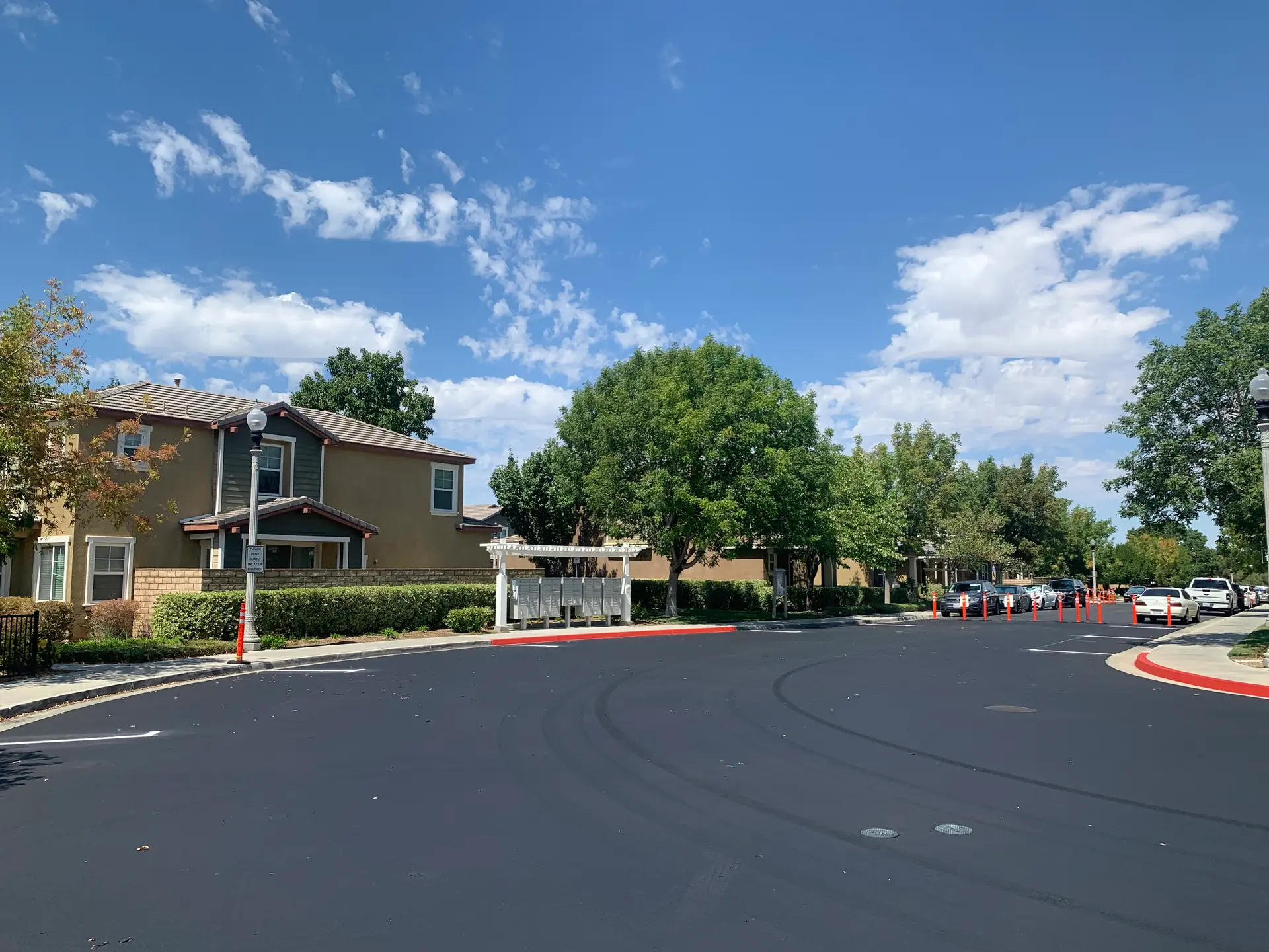 Newly seal coated HOA community drive by Native Union Engineering
